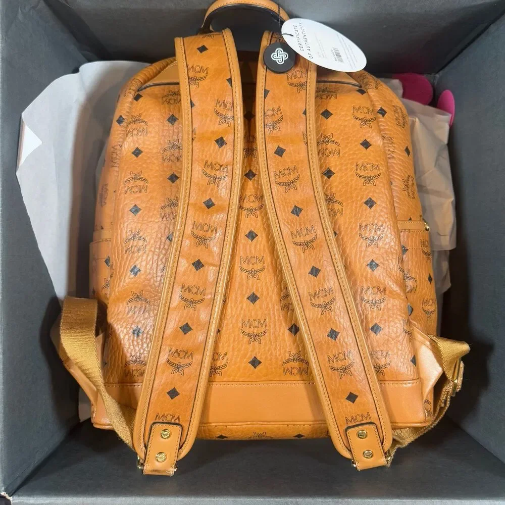 MCM Visetos Studded Medium Stark M Logo Collection Backpack Cognac Monogram